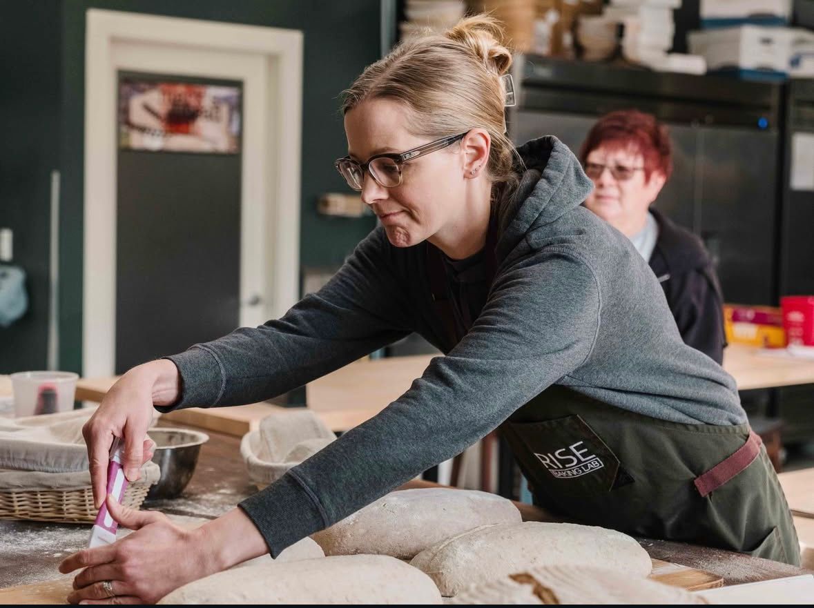 Student learning baking in person class