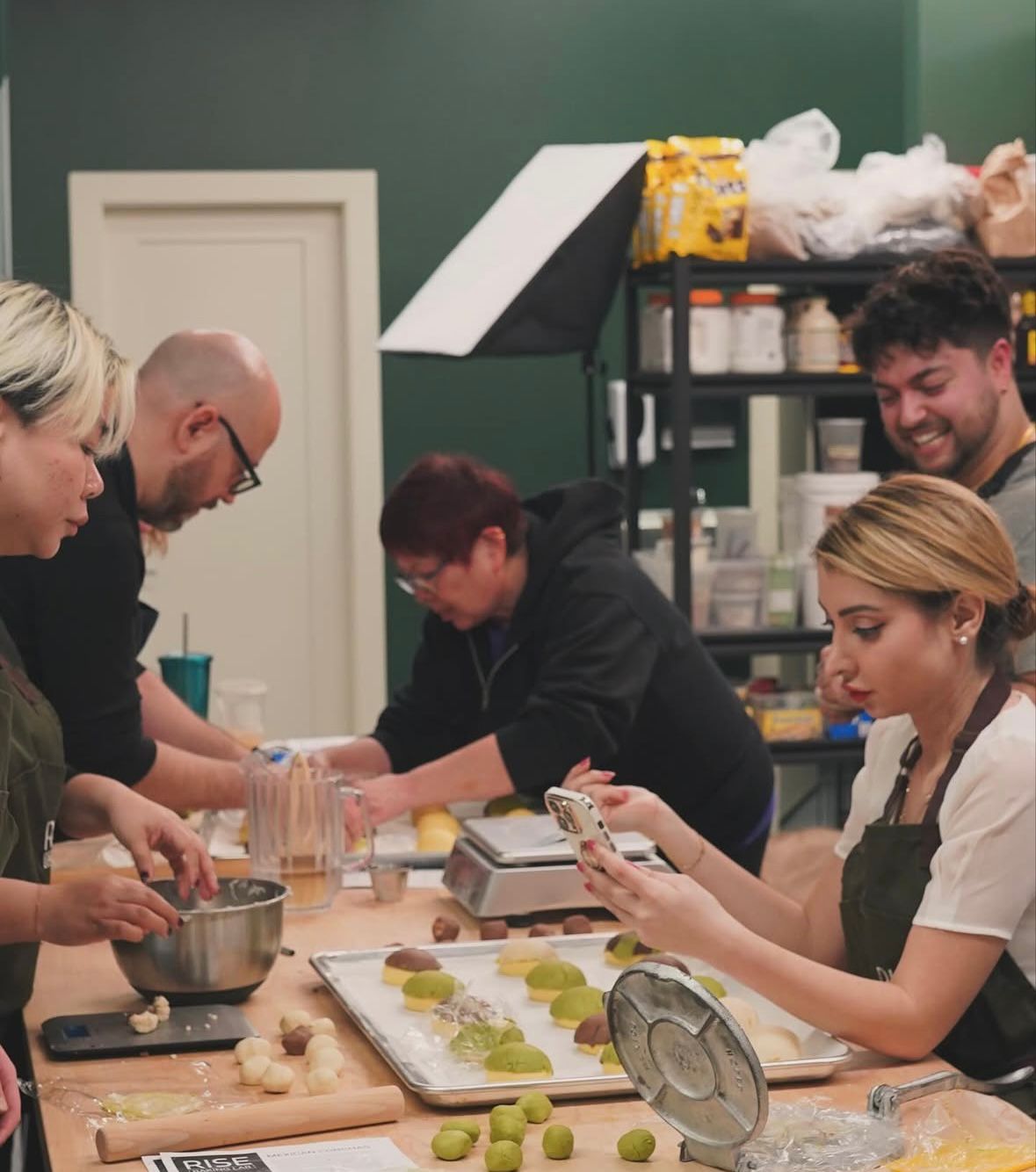Student learning baking in person class